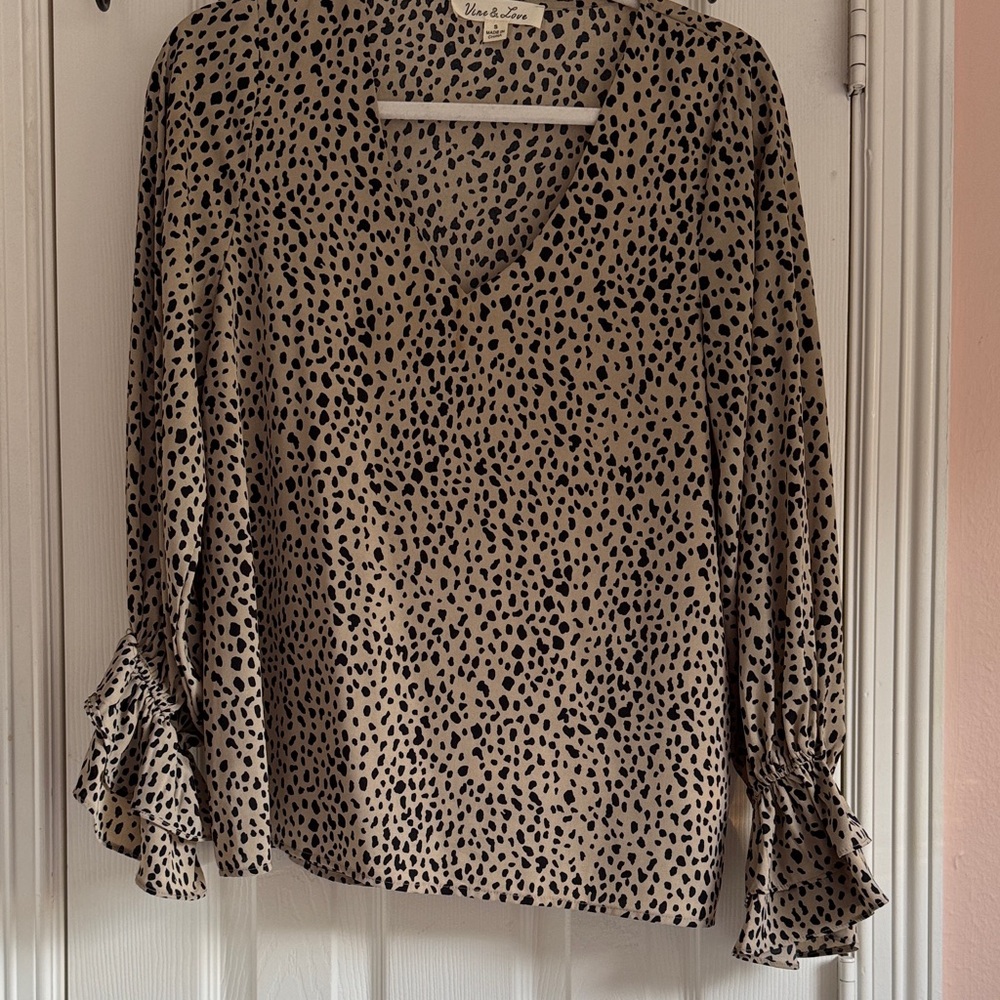 Vine & Love animal  print ruffled long sleeve details blouse. SMALL